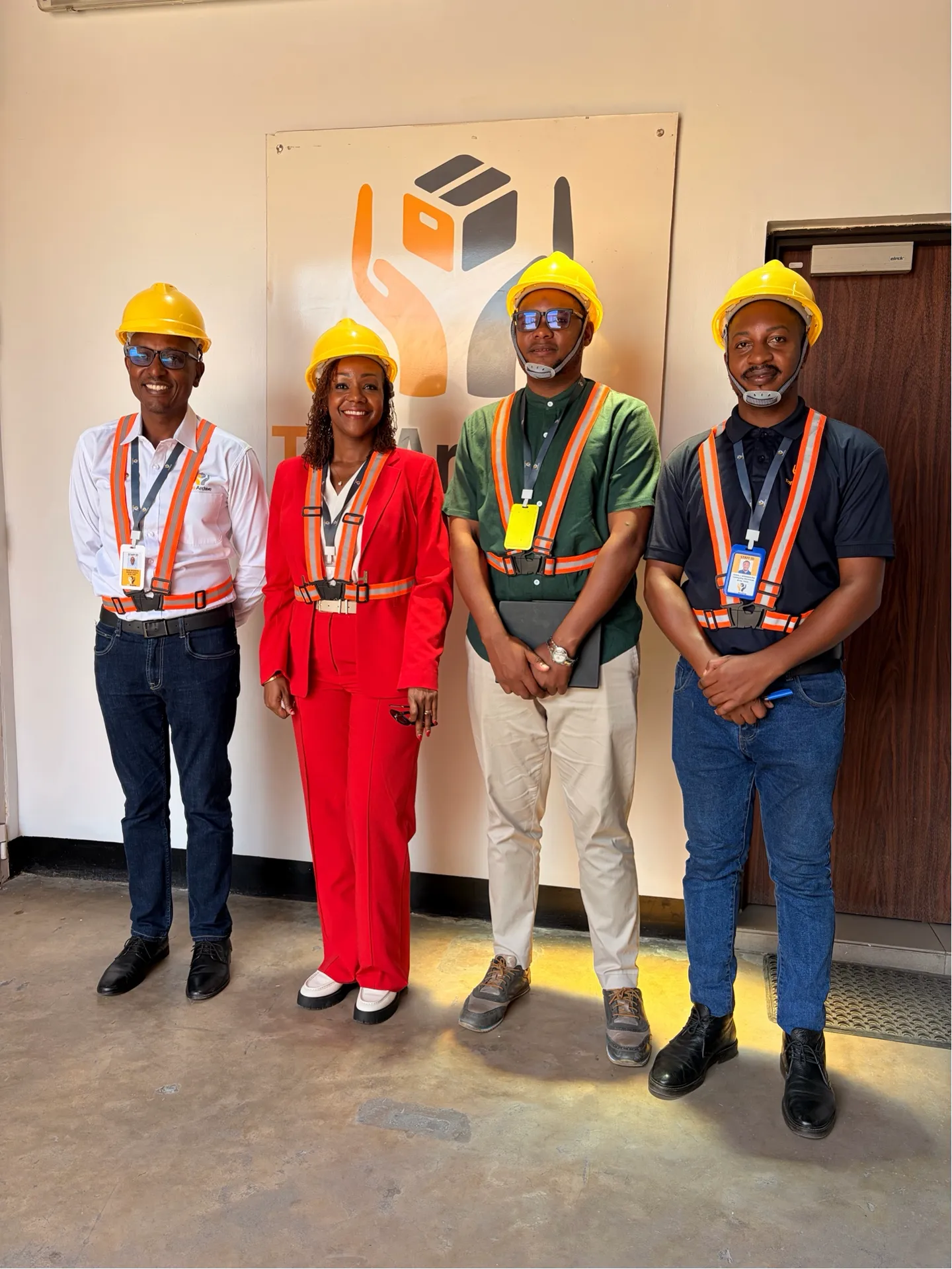Factory visit with hard hat and safety vest